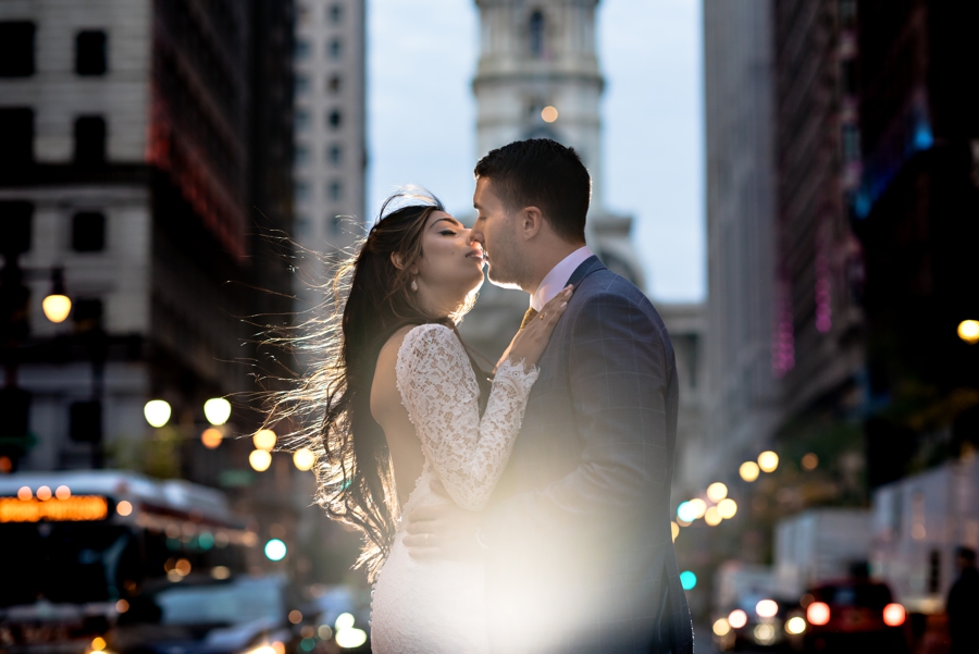An Indian Bride kisses her groom on Broad Street in Philadelphia.